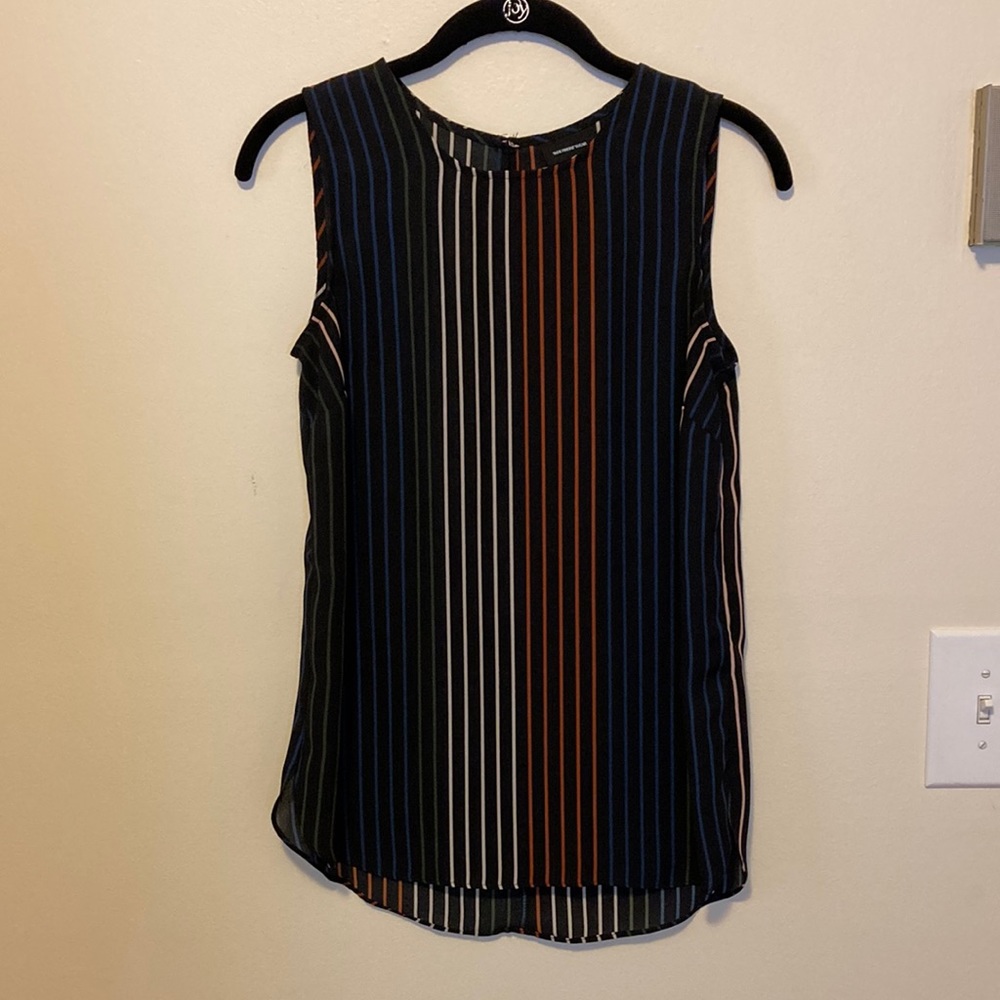Black stripe sleeveless blouse.